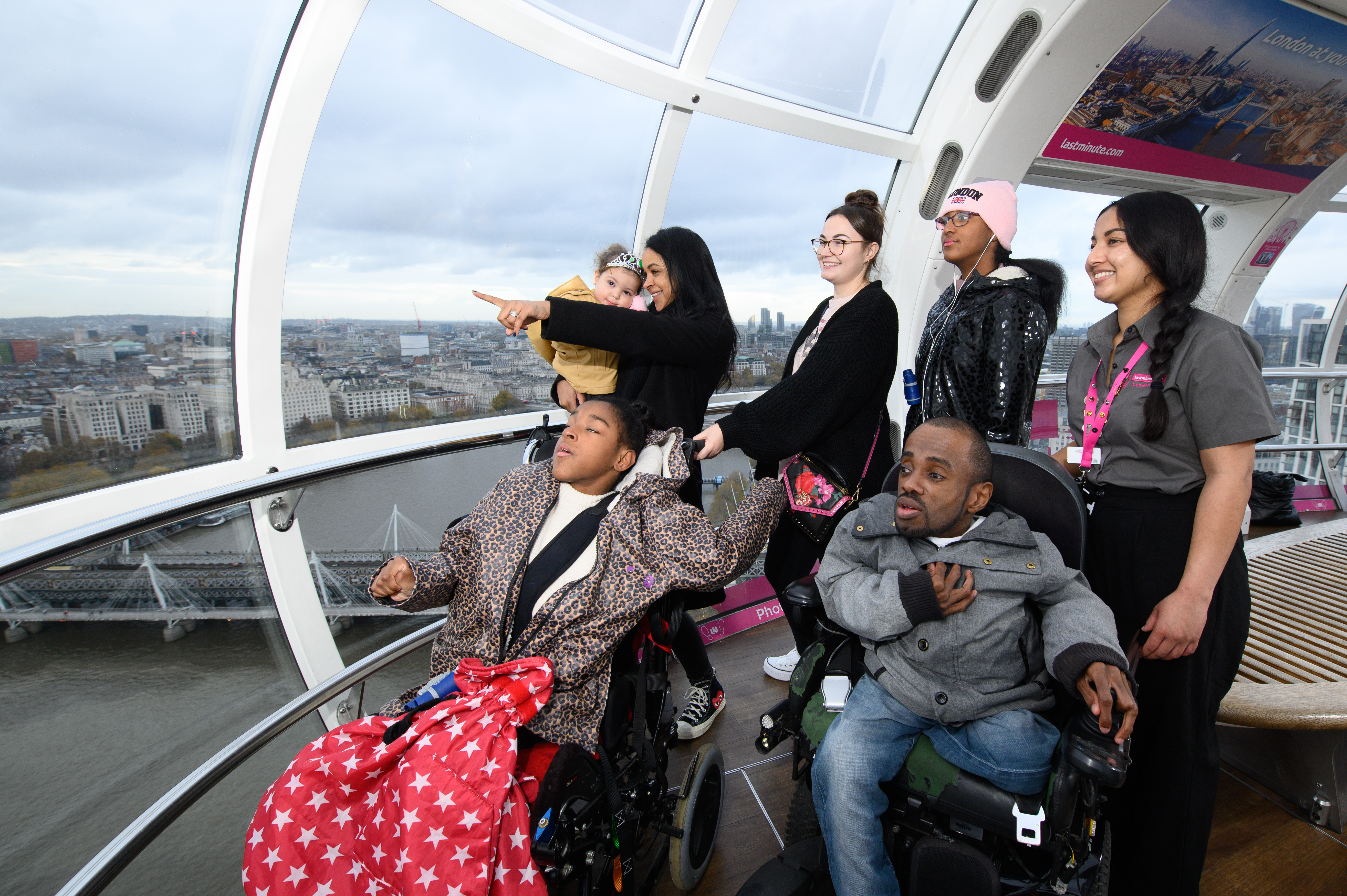 A family and friends enjoy a Magical Day Out on the London Eye 