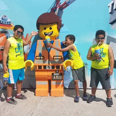 Three brothers enjoy a drink at LEGOLAND