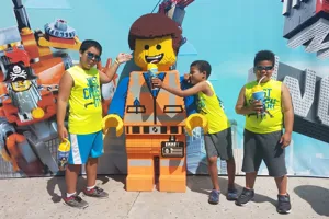 Children posing with a LEGOLAND character