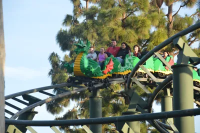 People riding a roller coaster